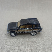 JEEP Wagoneer, Metalflake Black 1/64 Matchbox - фото